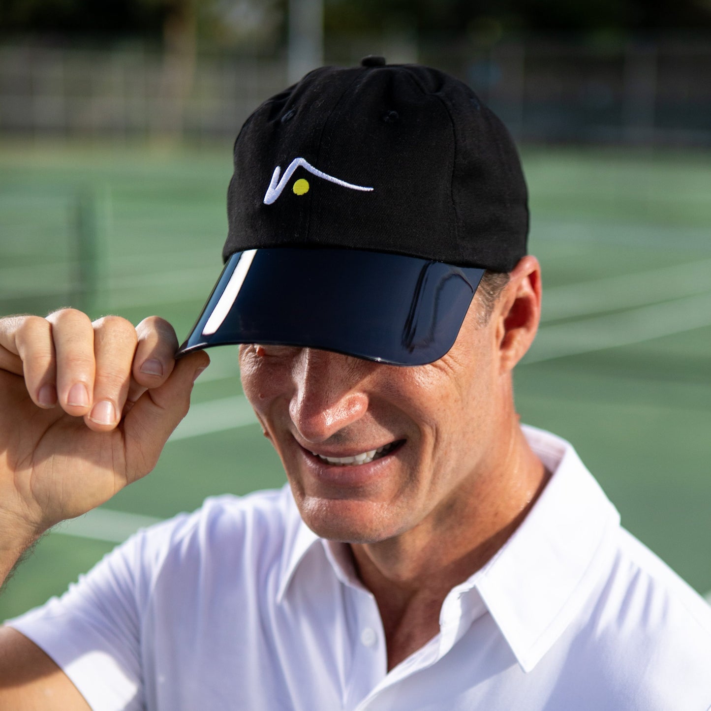 
                  
                    Black Sports Cap with Transparent UV Brim by Visto Visors
                  
                